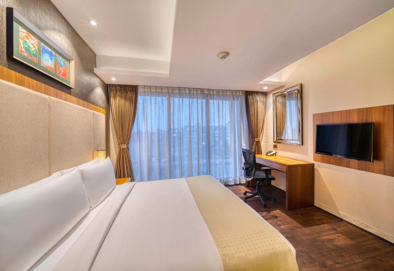 Holiday Inn Kolkata Airport By Ihg Extérieur photo A room at the hotel